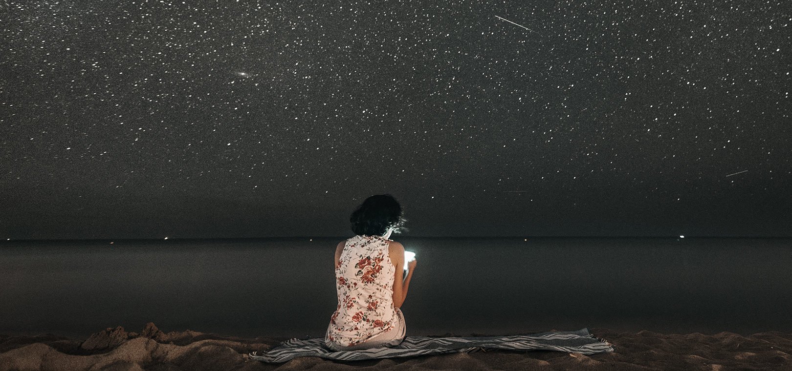 woman-stargazing-on-the-beach_1492176741.jpeg.jpg